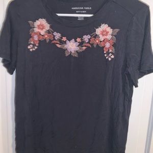 Navy shirt with stitched flowers